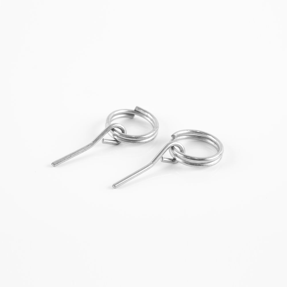 2 corner pin and keyring parts on white background