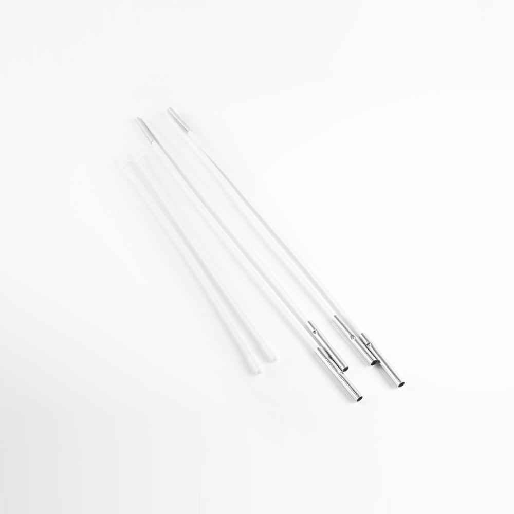 Tiny tent poles on white background